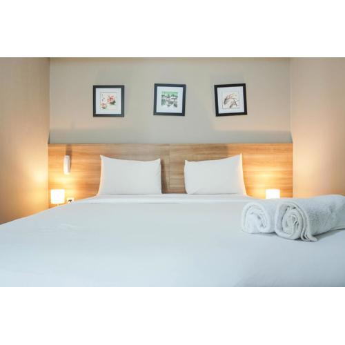 Elegant 1BR Apartment with Working Space Mustika Golf Residence By Travelio