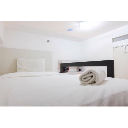 Elegant 2BR at 18th Floor Bassura City Apartment By Travelio