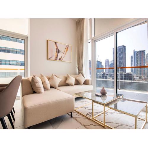 Elegant 2BR Ensuite with Canal & Burj Khalifa View