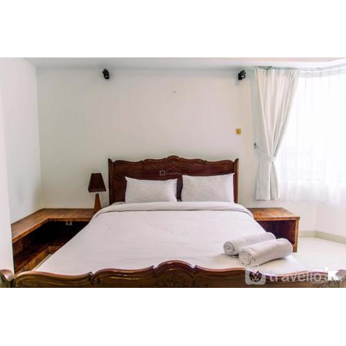 Elegant 2BR with Extra Room Apartment at Sudirman Tower Condominium By Travelio
