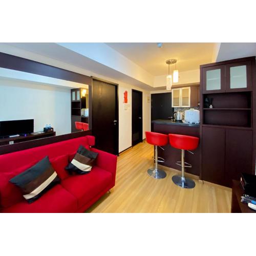 Elegant and and Spacious 1BR The Wave Kuningan Apartment By Travelio