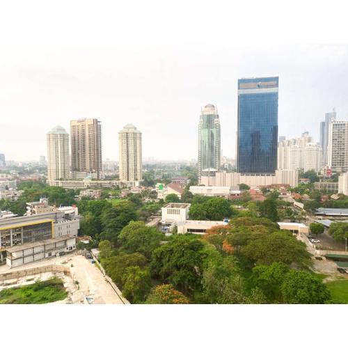 Elegant and Comfort 1BR Sudirman Suites Apartment By Travelio