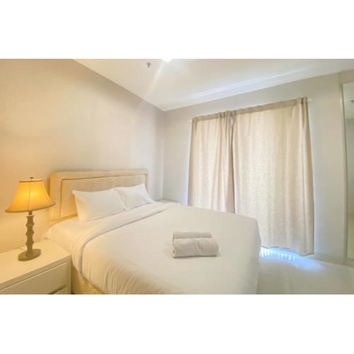 Elegant and Comfort 2BR Apartment at The Mansion Kemayoran By Travelio