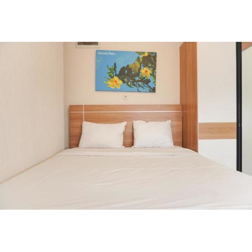 Elegant and Comfy 2BR above Mall at Bassura City Apartment By Travelio