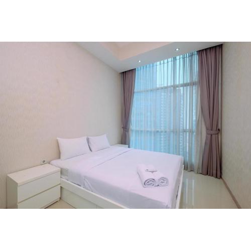 Elegant and Comfy 2BR Apartment at Casa Grande Residence By Travelio