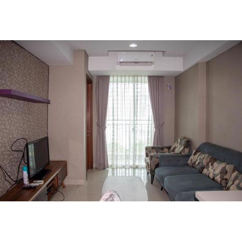 Elegant and Comfy 2BR Apartment at Springhill Terrace Residence By Travelio