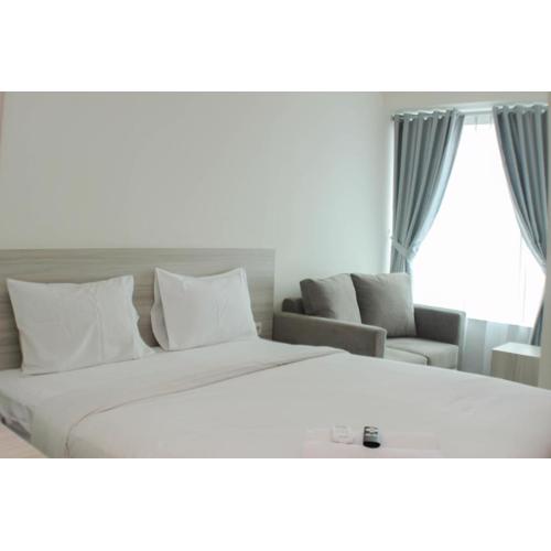 Elegant and Comfy Studio at Grand Kamala Lagoon Apartment By Travelio