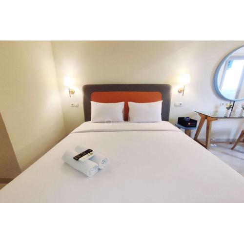 Elegant and Homey Studio at Marquis de Lafayette Apartment By Travelio