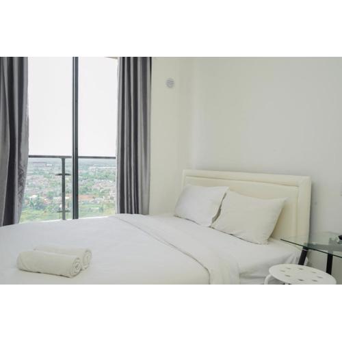 Elegant and Homey Studio at Sky House BSD Apartment By Travelio