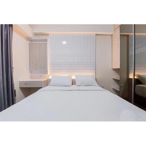 Elegant and Strategic 2BR Sky House BSD Apartment near ICE BSD By Travelio