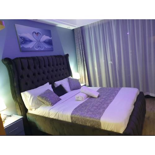 elegant classic apartment with heated swimming pool,modern equipped gym,ample parking space,and a relaxing rooftop with amazing scenic views