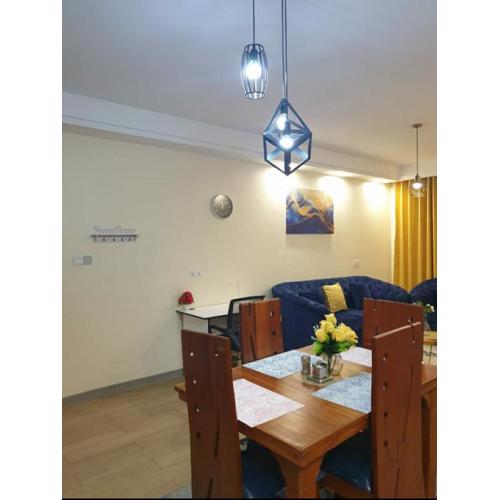 Elegant classy apartment with modern equipped gym, private parking space,and proximity to major shopping malls