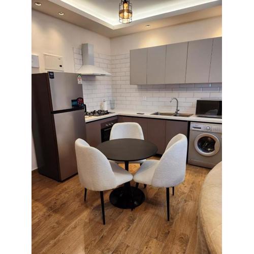 elegant executive fully furnished three bedroom apartment with ample parking space, swimming pool fully equipped gym children playing ground and amazing city views