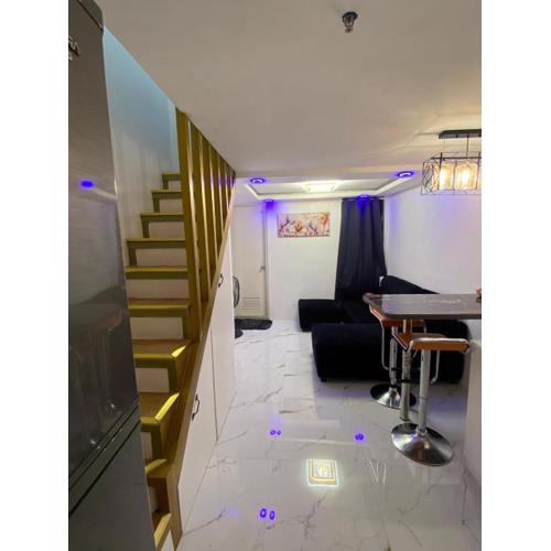 Elegant Golden Loft with Mood Lighting Central Location and Skyline Views