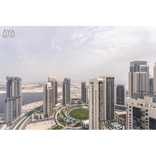 Elegant Luxury Apartment with Stunning Lake Views in Dubai Creek Harbour By ĀYA Boutique