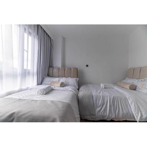 Elegant modern retreat residencies with heated swimming pool ,fully equipped gym and rooftop chillspot with amazing breathtaking city views