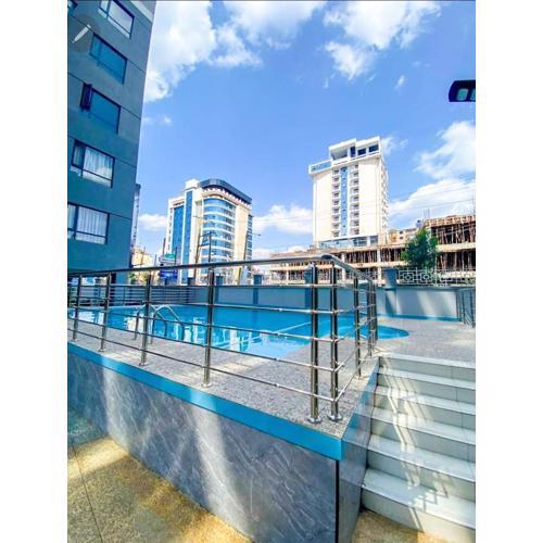 elegant modern two bedroom apartment which features a swimming pool,fully equipped gym and city views and proximity to major shopping malls in kilimani and neighborhood