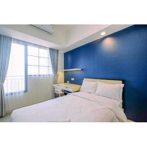 Elegant Studio at Evenciio Margonda Apartment By Travelio