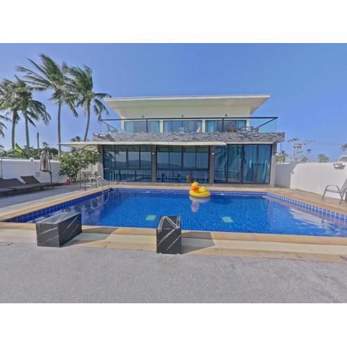 Elegante 4-Zi-Poolvilla mit Strandzugang