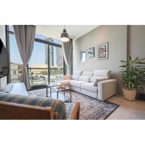 Elite LUX Holiday Homes - Luxurious 1BR Suite in Signature Livings JVC - Dubai