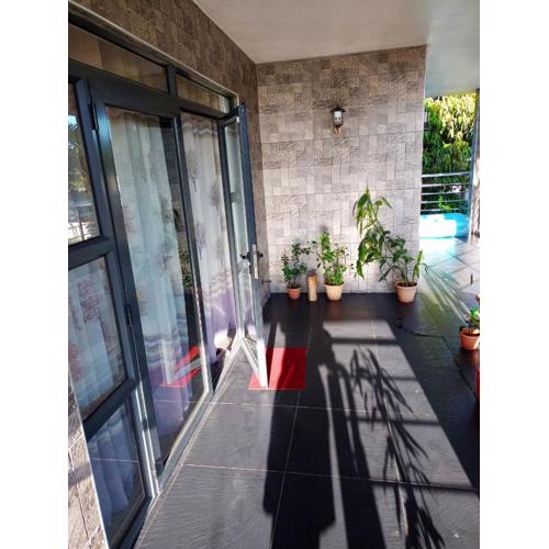 Enchanting Bungalow in Chemin Grenier with Jacuzzi and Garden