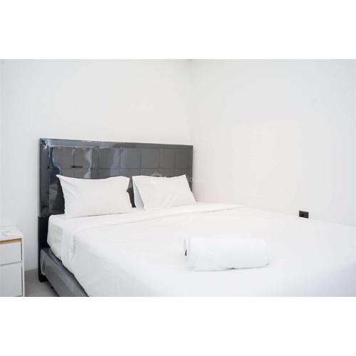 Enjoy Living 2BR Apartment at Carstensz Residence By Travelio