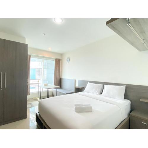 Enjoy Living Studio Room at High Floor Grand Kamala Lagoon Apartment By Travelio