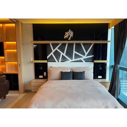Escape 1BR One Uptown BGC w/ Sound System
