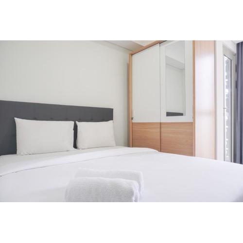 Exclusive and Cozy 1BR at Gold Coast Apartment By Travelio