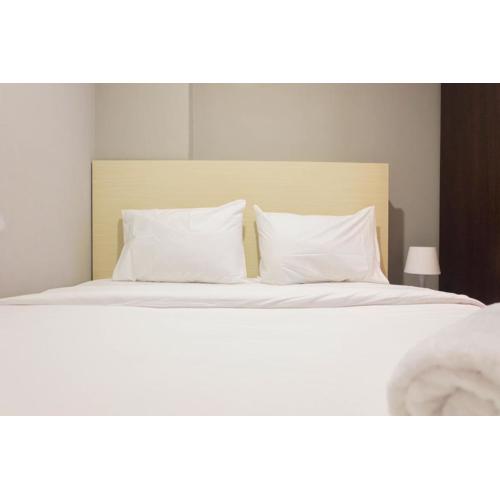 Exclusive and Spacious 1BR Apartment at Bassura City By Travelio