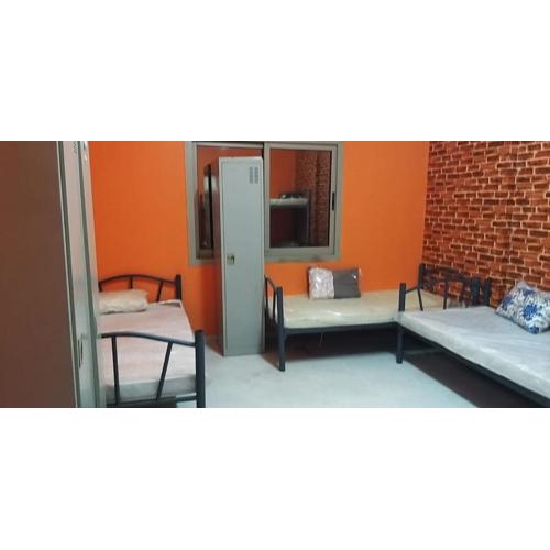 Executive Sharing Bed With Other Male Guests