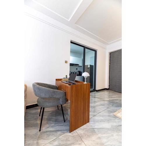 executive vibrant view three bedroom apartment with swimming pool,mordern equipped gym free parking space and, child play area and comforting rooftop with city views in kilimani