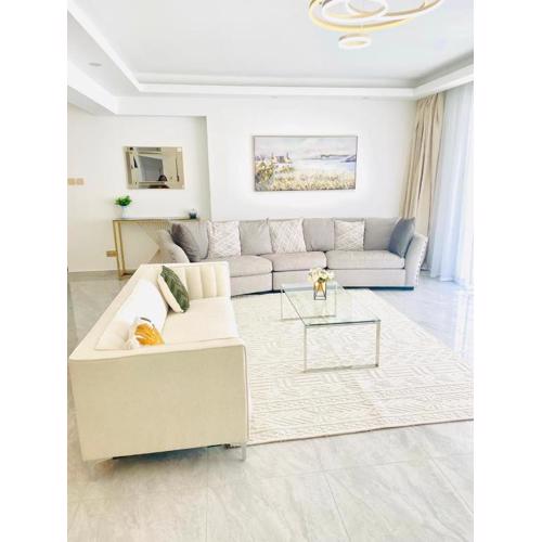 executive vibrant view three bedroom apartment with swimming pool,mordern equipped gym free parking space and, child play area and comforting rooftop with city views