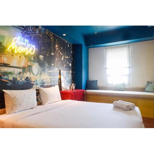 Exquisite 1BR Apartment at Puri Mas By Travelio