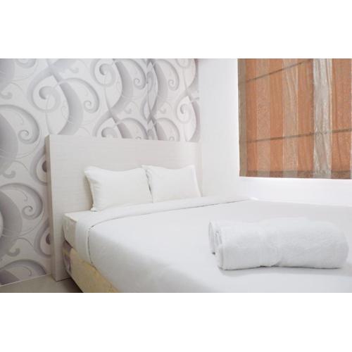 Exquisite 2BR Bassura City Apartment near Shopping Mall By Travelio