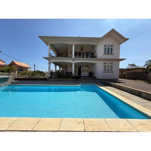 Family-Friendly 3-Bedroom Coastal Haven in Flic en Flac