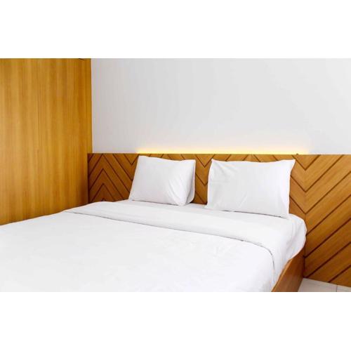 Fancy and Elegant Studio at Patraland Urbano Apartment By Travelio