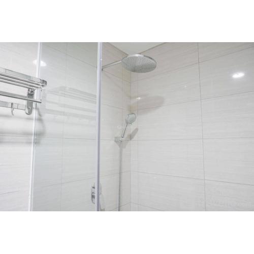 Fancy and Nice 1BR at Ciputra International Apartment By Travelio