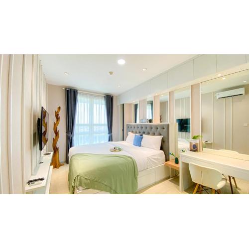 Fancy and Nice 1BR at Citralake Suites Apartment By Travelio