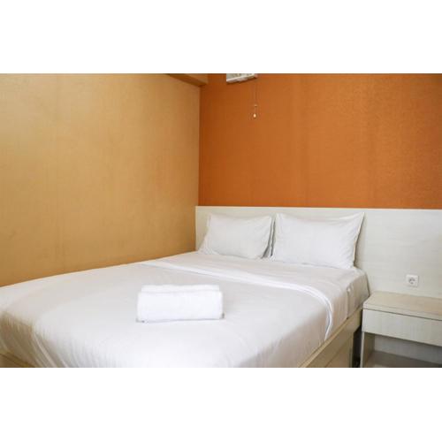 Fancy and Nice 2BR Apartment at Green Pramuka City By Travelio