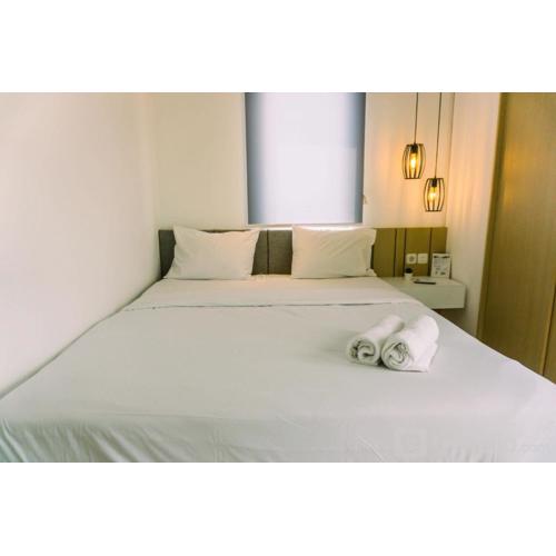 Fancy and Serene 1BR Apartment at M-Town Residence By Travelio