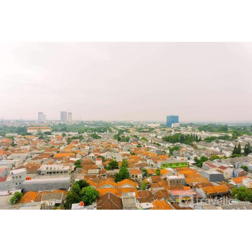 Fancy and Simply 1BR Apartment at M-Town Residence By Travelio