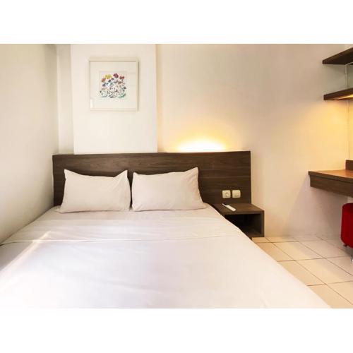Fancy Designed 2BR at Gateway Ahmad Yani Cicadas Apartment By Travelio