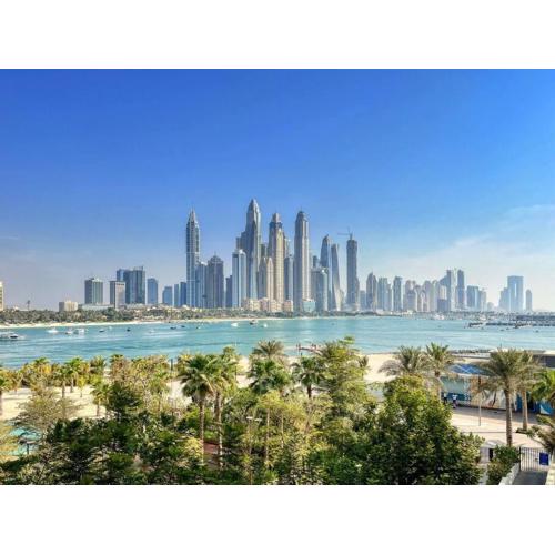 Five Palm Luxury - 2BR with Pool View, Gym & Prime Beach Stay