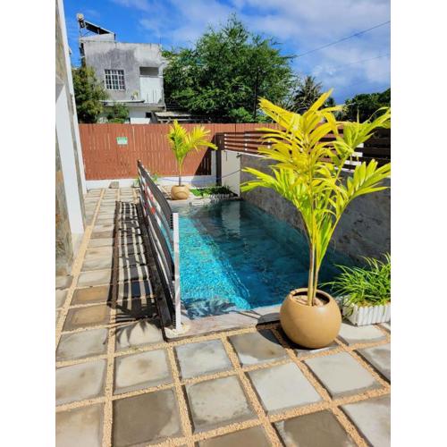 Freesia Apartment by Mau-Rent Houses