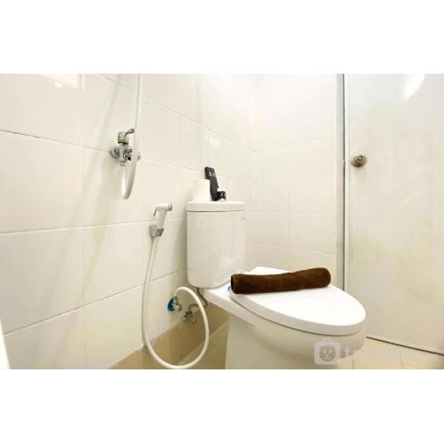 Full Furnished and Homey 2BR Bassura City Apartment near Mall By Travelio