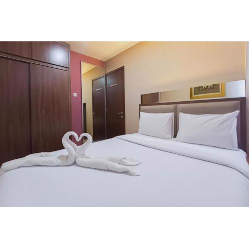 Full Furnished with Comfort Design 2BR at Vivo Apartment By Travelio