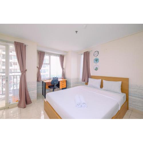 Fully Furnished and Comfy Studio Apartment Margonda Residence 3 By Travelio