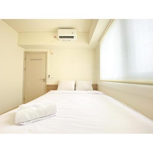 Fully Furnished and Homey 3BR at Meikarta Apartment By Travelio