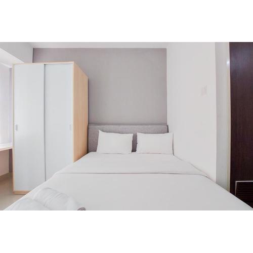 Fully Furnished and Homey Studio Serpong Garden Apartment By Travelio